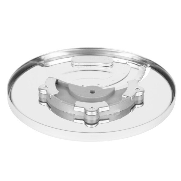 A circular metal slicing disc with a circular handle.