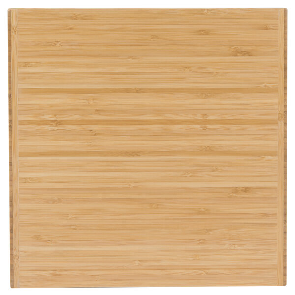 A Cal-Mil bamboo cube display riser on a wood surface.