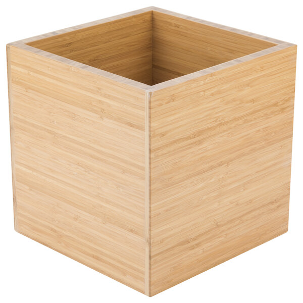A bamboo cube riser with a square top.