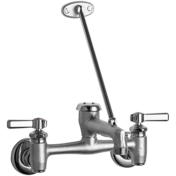 A silver and chrome Chicago Faucets wall-mounted faucet with two handles.