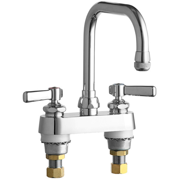 A Chicago Faucets deck-mounted faucet with two brass handles.