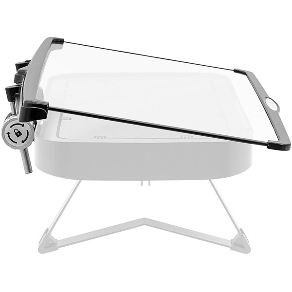 An EcoBurner glass lid on a table with a salad bar.