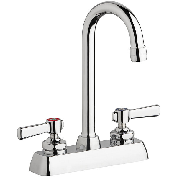 A silver Chicago Faucets deck-mounted faucet with 2 gooseneck spouts and lever handles.