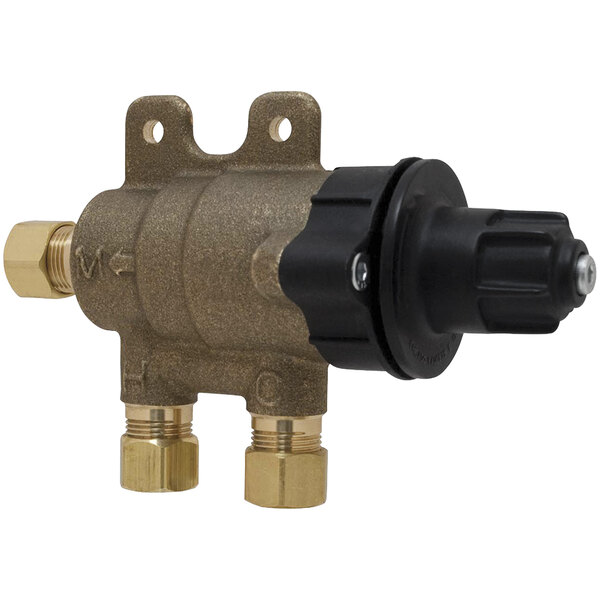 A close-up of a Chicago Faucets brass thermostatic mixing valve.