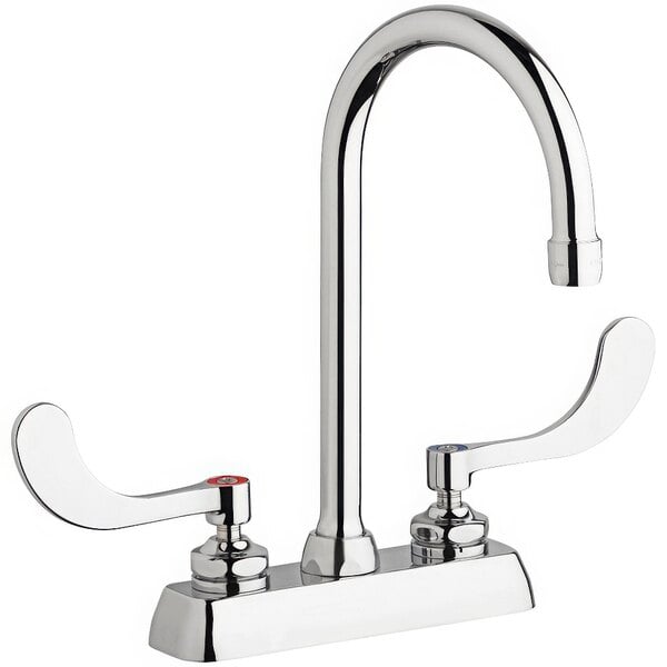 A chrome deck-mounted Chicago Faucets with 4" wristblade handles and a 5 1/4" rigid/swing gooseneck spout.