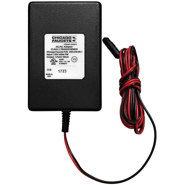 A black Chicago Faucets plug-in transformer with red and black wires.