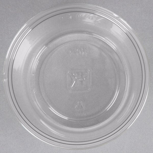 A Fabri-Kal clear plastic deli container with a square bottom.