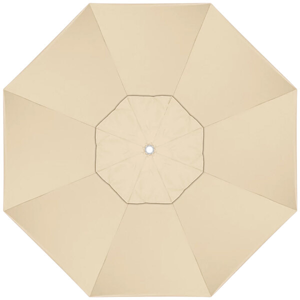 A top view of an open beige California Umbrella.
