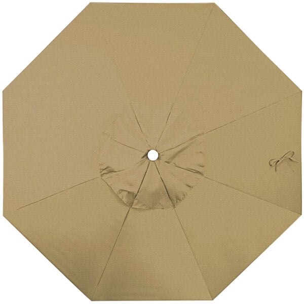A top view of a tan California Umbrella replacement canopy.