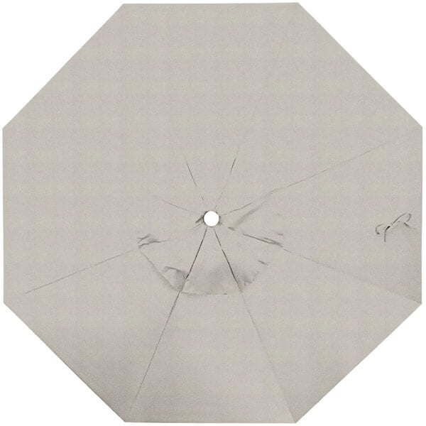 A white California Umbrella replacement canopy with a hole in the center.