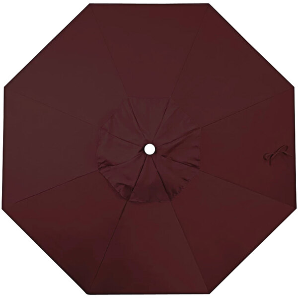 A close-up of a burgundy California Umbrella canopy.