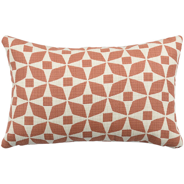 An Astella peach and white geometric throw pillow with a pattern.