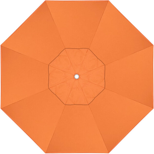 An orange umbrella with a white center.