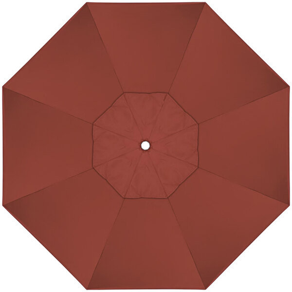 A top view of a red California Umbrella with a white center.