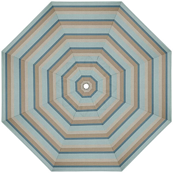 A close-up of a California Umbrella Gateway Mist Sunbrella canopy with blue and brown stripes.