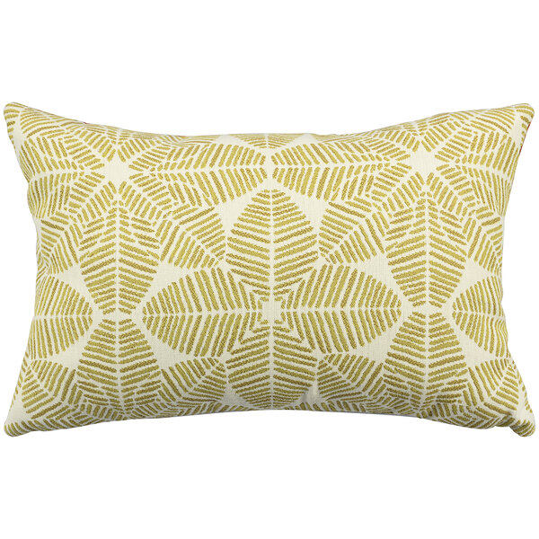 An Astella Palmetto throw pillow with a yellow and white leaf print.