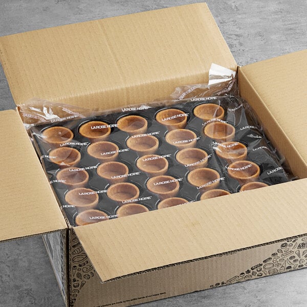 A box of La Rose Noire small round savory tart shells.
