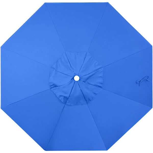A royal blue umbrella with a white circle.