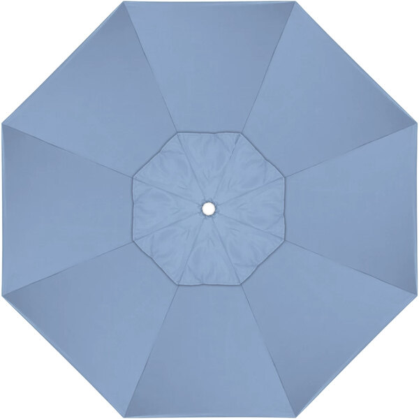 A close-up of a blue California Umbrella with a white circle in the center.