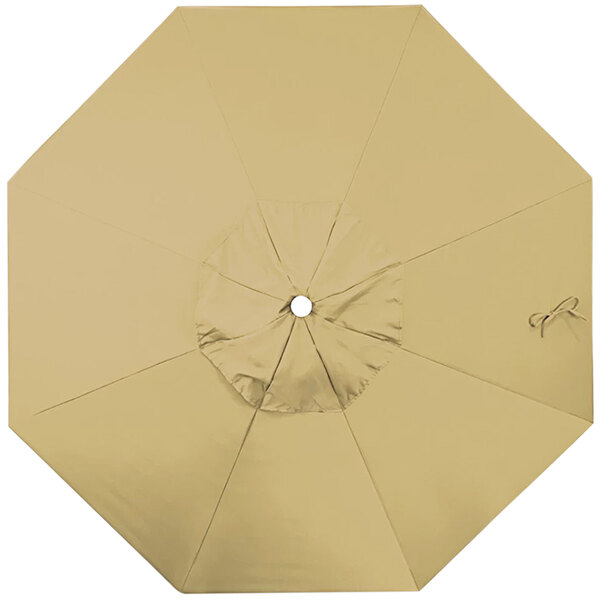 A top view of a tan California Umbrella replacement canopy.