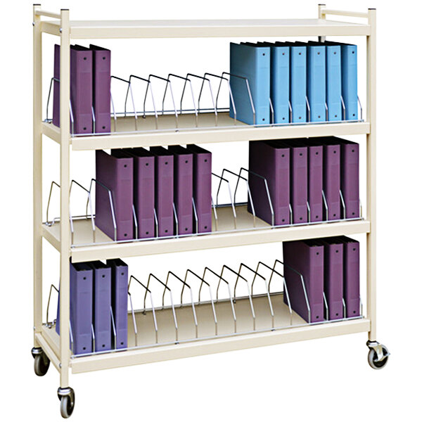 A white Omnicart with beige shelves holding binders.