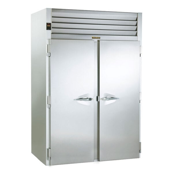 A large stainless steel Traulsen Correctional roll thru refrigerator with two doors.