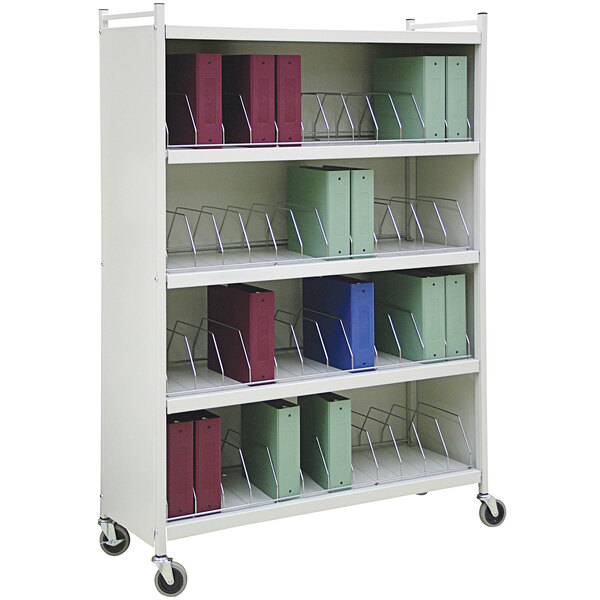 An Omnimed light gray metal cart with white shelves holding blue file folders.