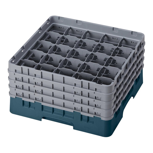 A teal plastic Cambro glass rack with 25 compartments and 4 extenders.