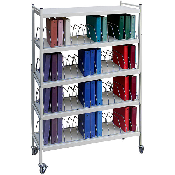 A light gray Omnimed medical cart with multicolored binders on the shelves.