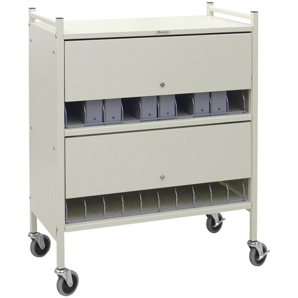 An Omnimed beige metal cart with locking doors.