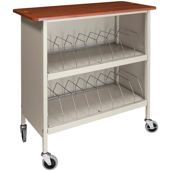 A beige Omnimed cabinet style medical cart with metal racks.