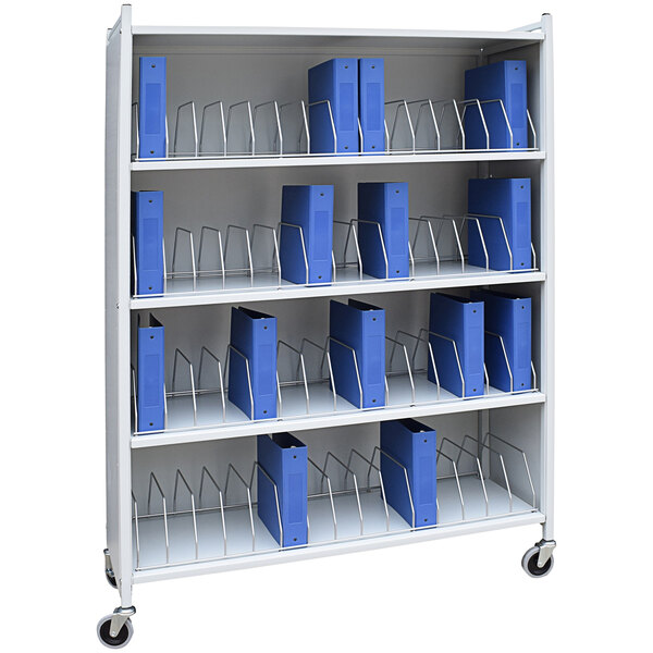 An Omnimed light gray cart with blue binders on a shelf.