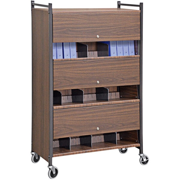 A woodgrain Omnicart with black handles and blue folders on a wooden shelf.