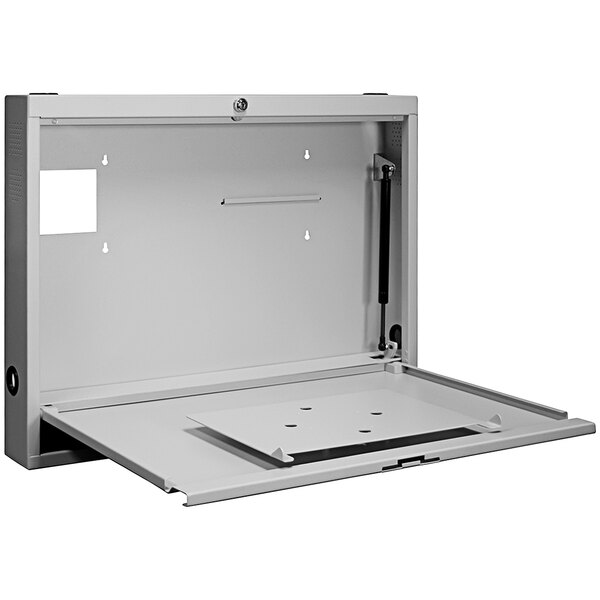 A light grey metal wall desk with the door open.