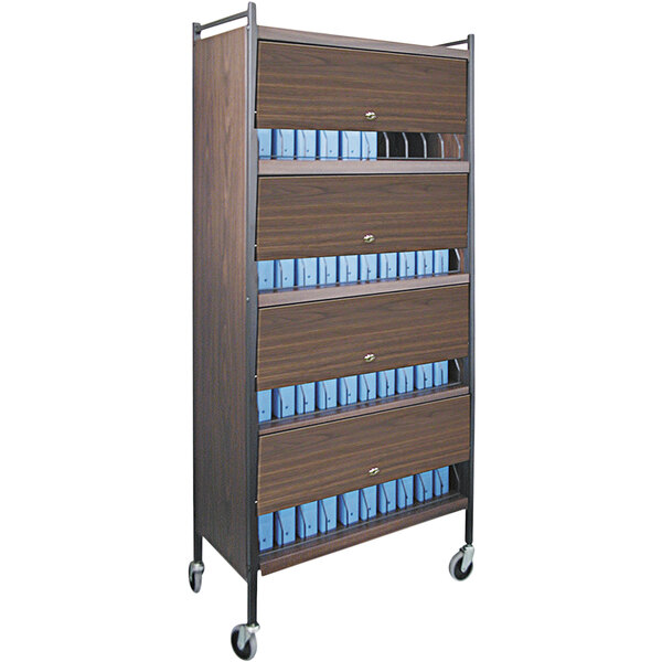 An Omnimed woodgrain cart with brown metal panels and blue binders inside.