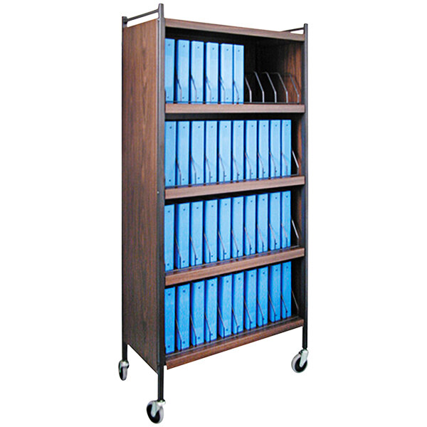 An Omnimed woodgrain medical cart with blue folders on a shelf.