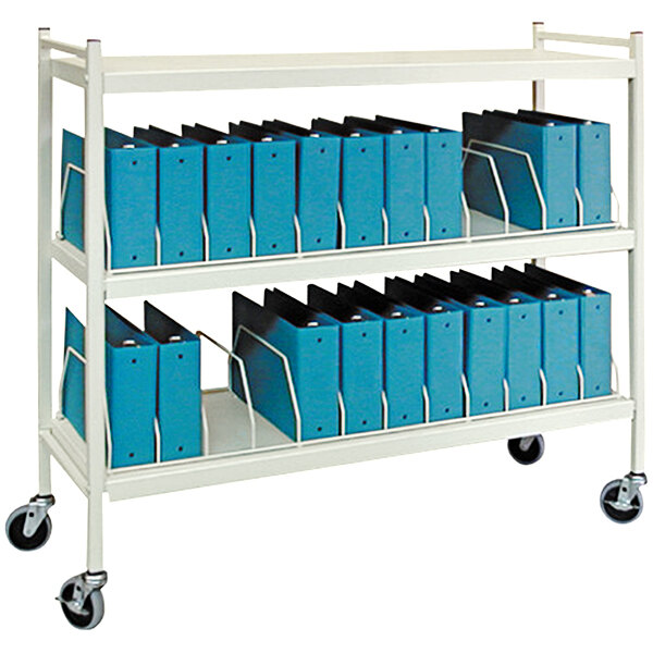 A white metal Omnimed cart with blue file folders.