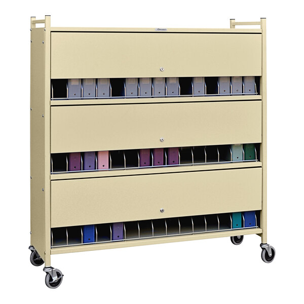 A beige metal cart with several drawers.