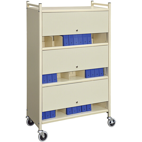 An Omnimed beige 3-shelf cabinet style rack with locking panels.