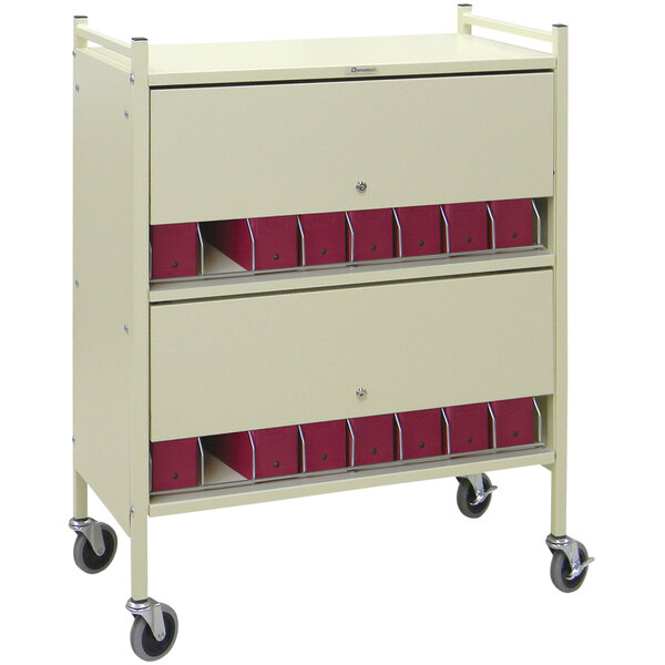 A beige Omnicart medical cart with closed doors and a lock.