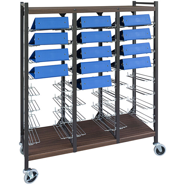 An Omnimed woodgrain metal cart with blue trays on wheels.