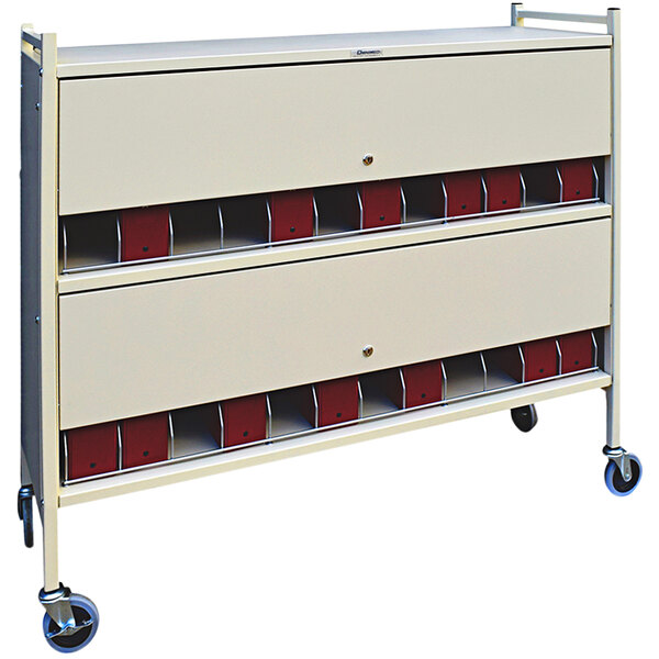 An Omnimed beige metal cart with locking panels.