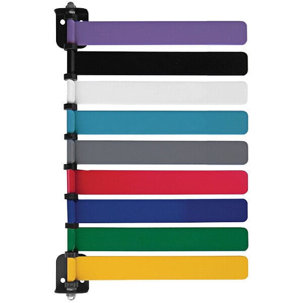 An Omnimed exam room flag system with 9 colorful plastic strips hanging on a wall.