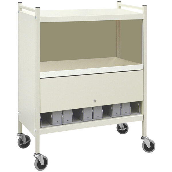 A beige Omnicart medical cart with shelves and a locked panel.