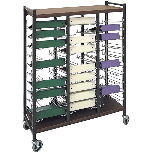 An Omnimed woodgrain cart with metal shelves and different colored drawers.