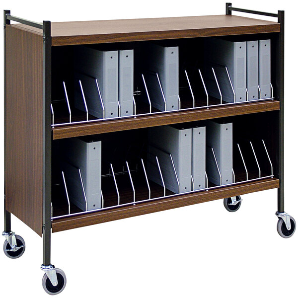 An Omnimed woodgrain medical cart with shelves of binders.