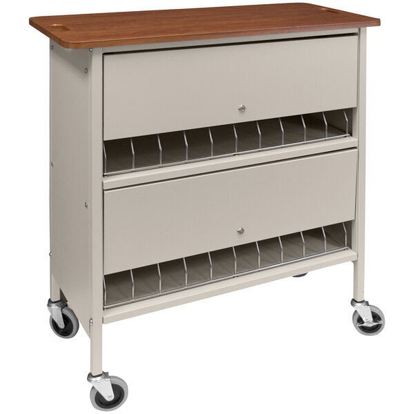 A beige Omnimed locking chart rack cart with a cherry wood top.