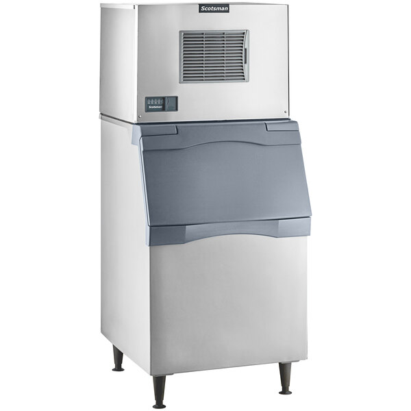A Scotsman air cooled ice machine with a grey plastic storage bin.
