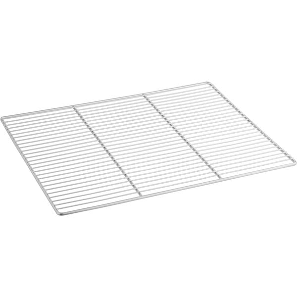 A close-up of a white metal wire shelf with a grid on it.