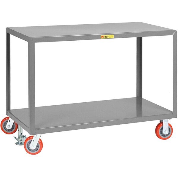 A grey metal Little Giant table cart with orange wheels.